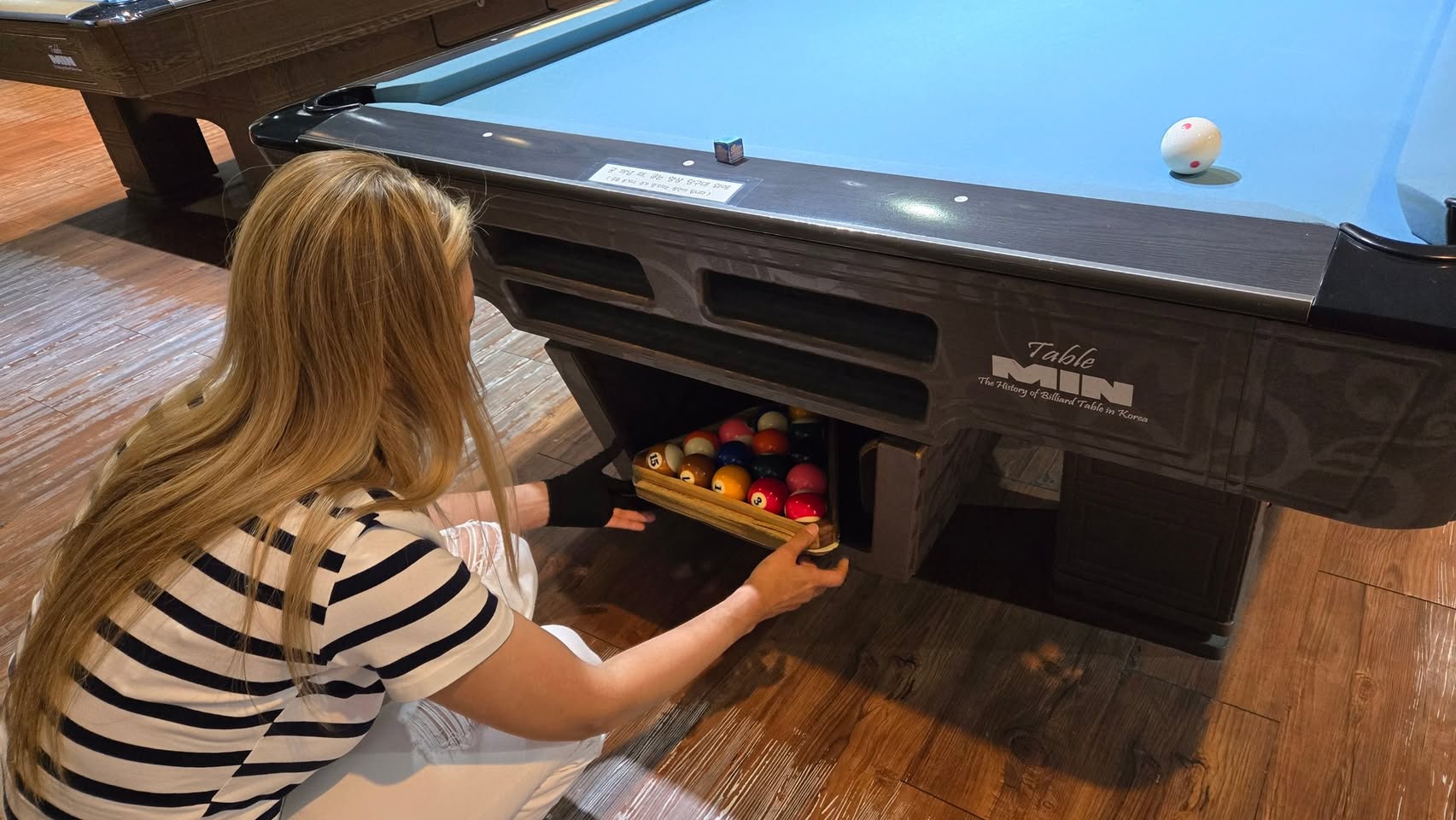 Of course we found a pool hall in Seoul. The Soprano racking 'em up.