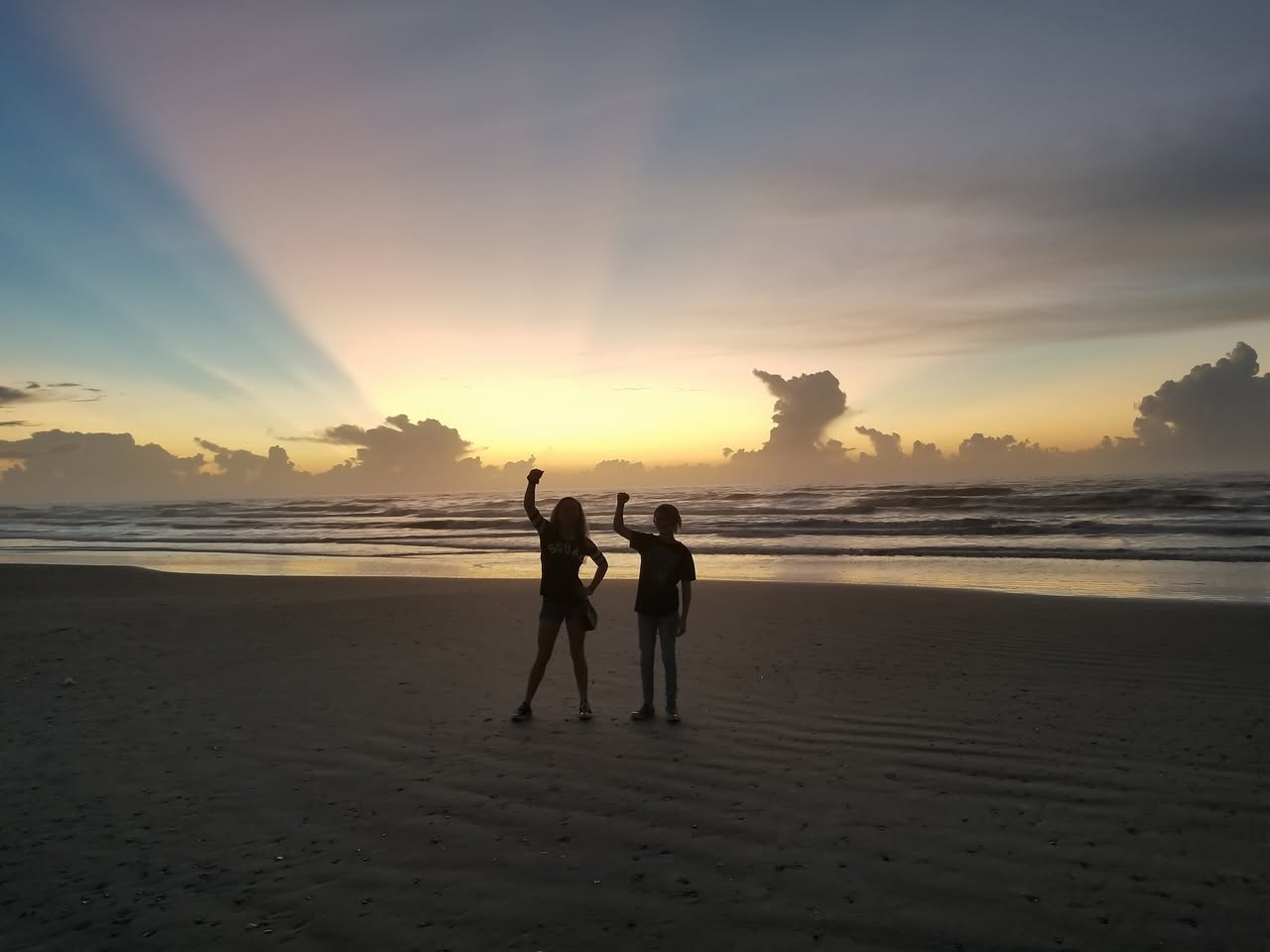 Galveston Island sunrise with the kids. Worth the 5am alarm.